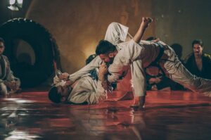 Brazilian Jiu Jitsu training for beginners practicing controlled grappling